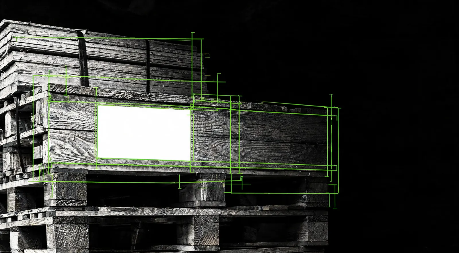 A pallet slat prepared with a blank space, then stenciled with the Salesman Solutions mark